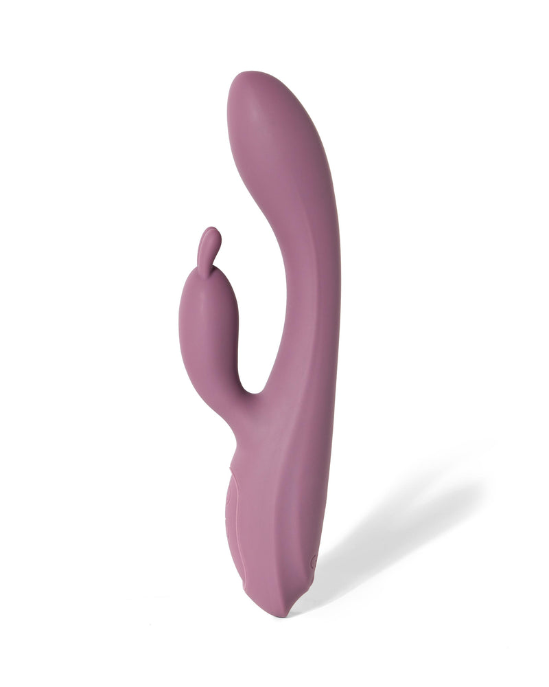 Exsilio mauve vibrator in side profile, showing its curved shaft and smaller external arm.