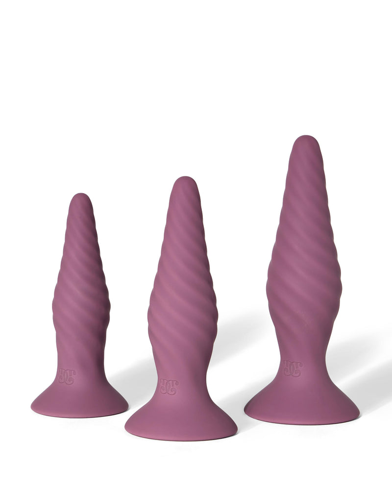 The three interchangeable mauve Radicus forms, with textured surfaces and flared bases.
